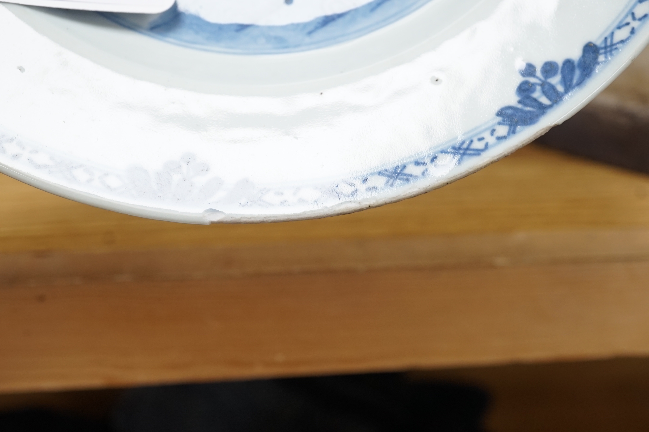 A Chinese blue and white ‘dragon’ dish, marked to base, 28cm diameter, together with a Samson blue and white ground serving dish with gilt decoration